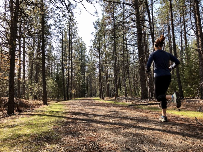 runner running on the trails
